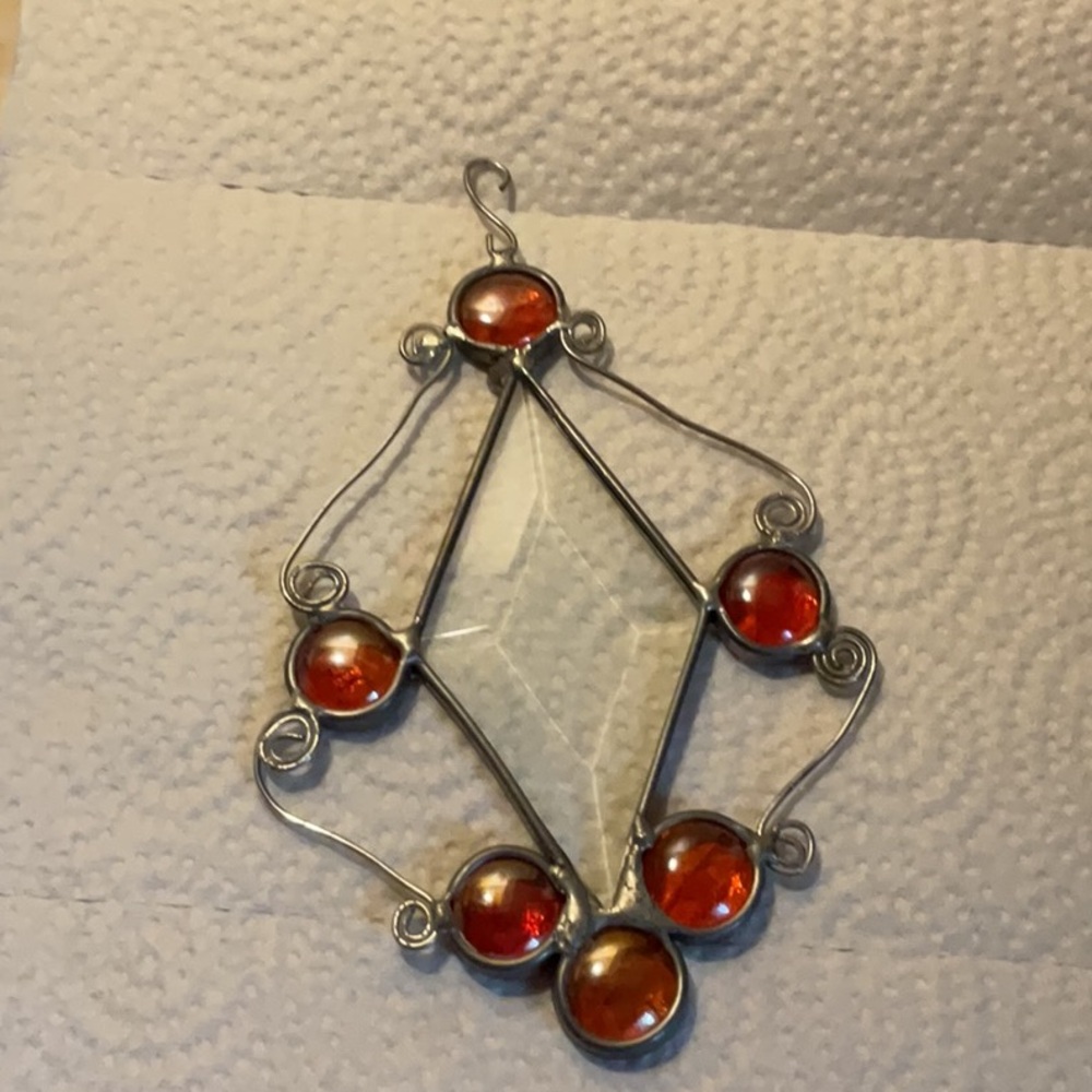 Elegant Silver and Red Stained Glass sun catcher.